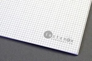 インスタンス株式会社　様オリジナルノート 本文は方眼罫と小さめのロゴを右下に印刷