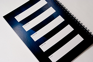 NPO法人　7FIELDS　様オリジナルノート 「裏表紙印刷」でリング製本の裏表紙にもデザイン 。枠の中には、1年後、3年後、10年後の目標や将来の夢を書き込める。
