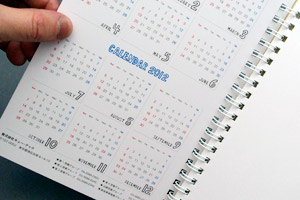 株式会社キュー・テック　様オリジナルノート 「表紙内側印刷」で翌年カレンダーを印刷