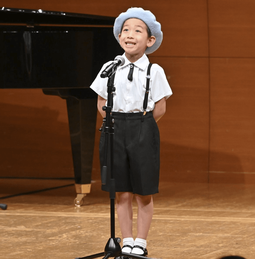 合唱団で歌を披露する、土谷さんのお子さん